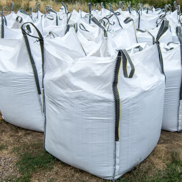 Row of white FIBC bags, bulk material storage, JUMBO BAGS